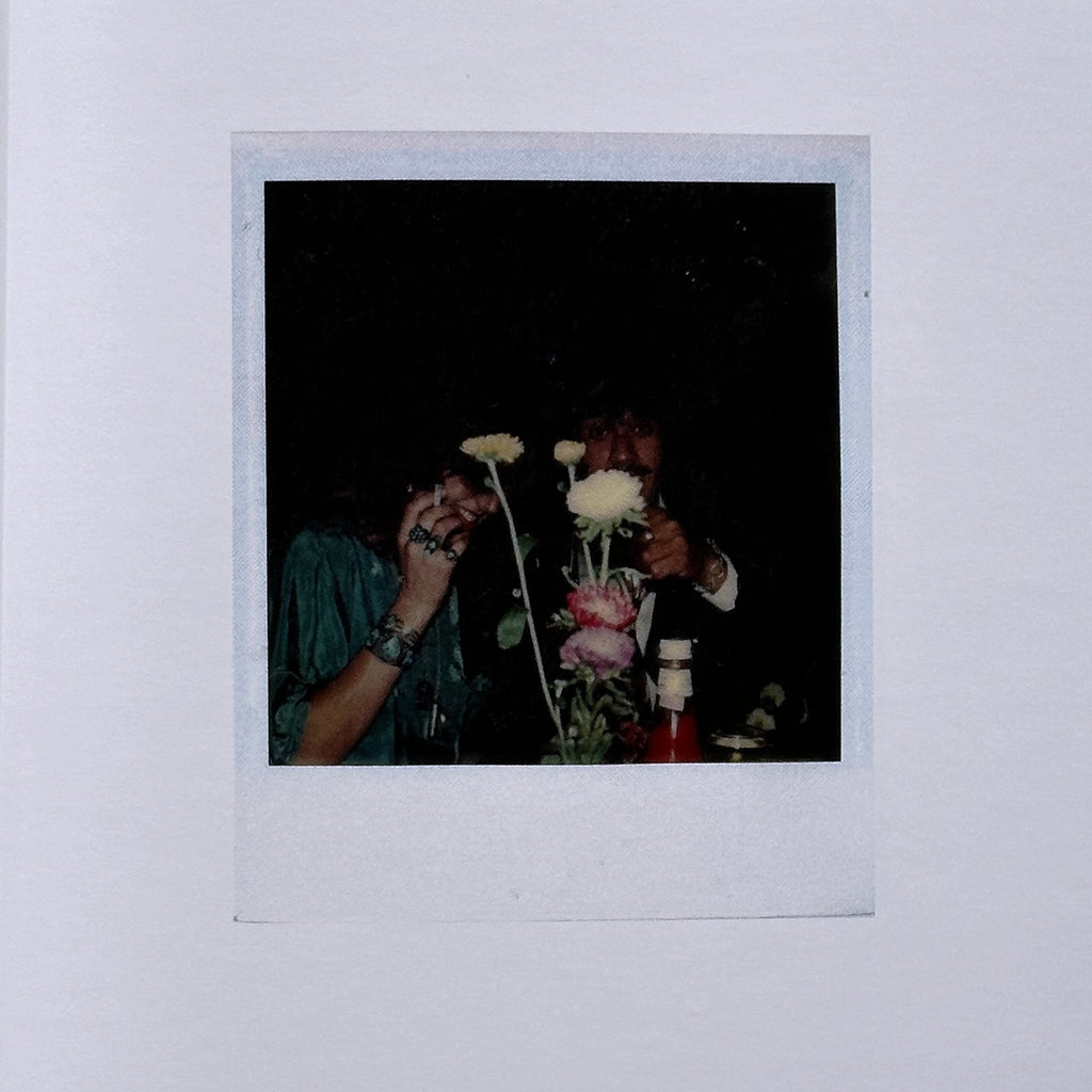 Polaroids by Carinthia West
